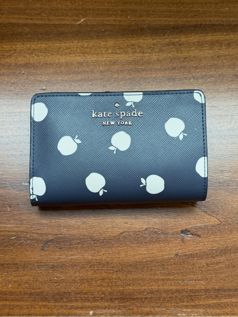 Adorable kate spade navy wallet with cute apple print